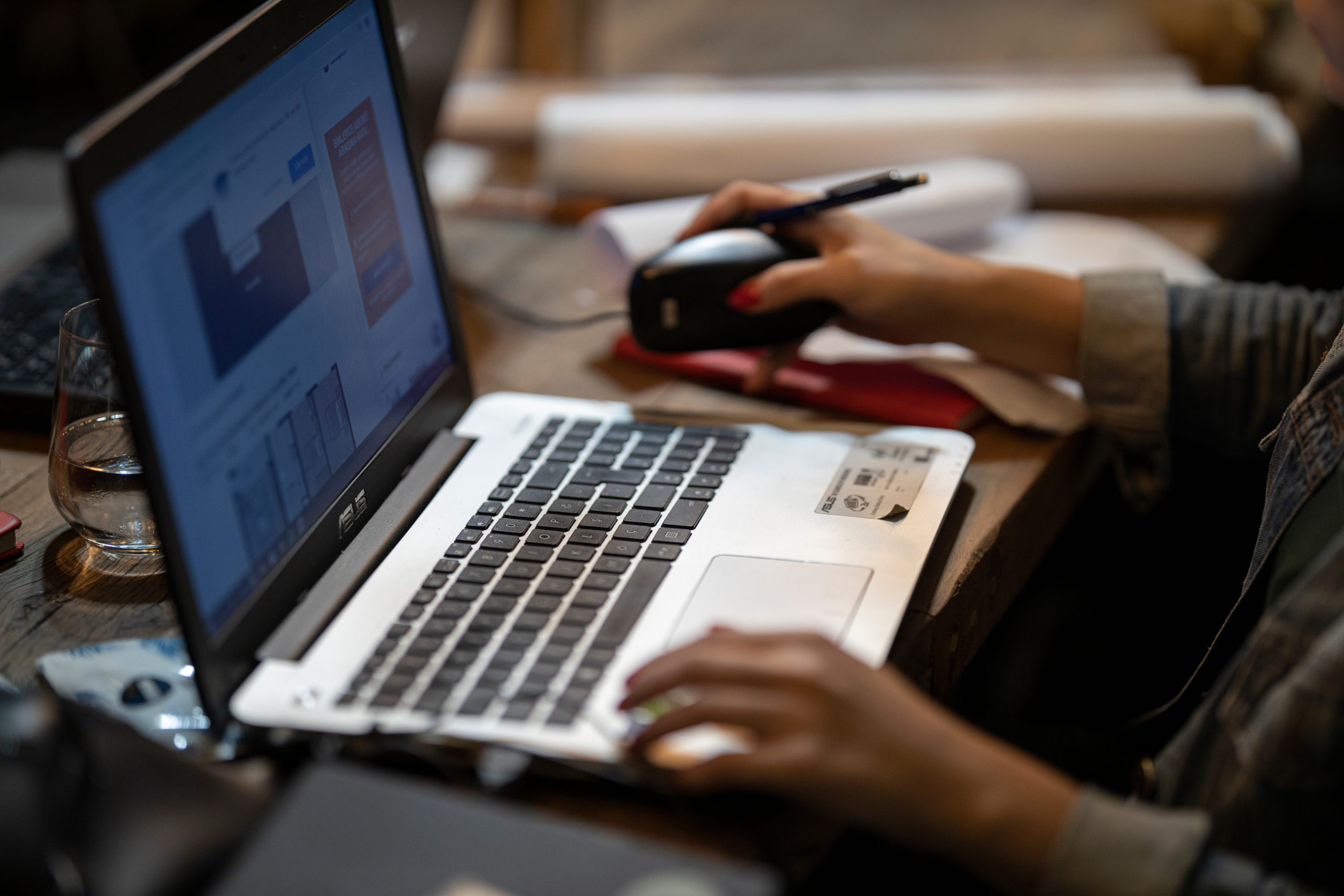 a woman working with laptop